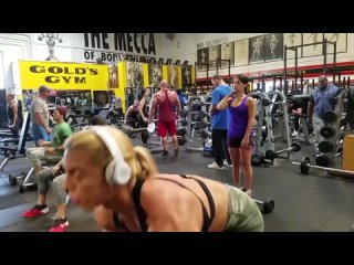 female bodybuilder dominates guy girls flexing biceps